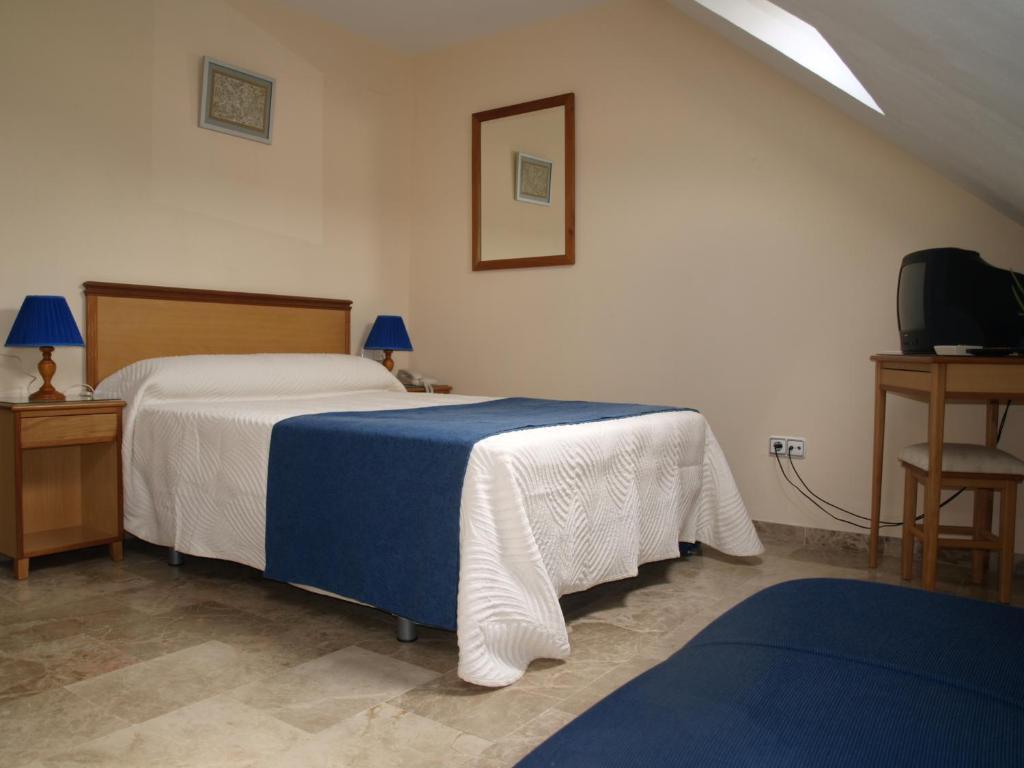 Hotel Al-Yussana Lucena Phòng bức ảnh